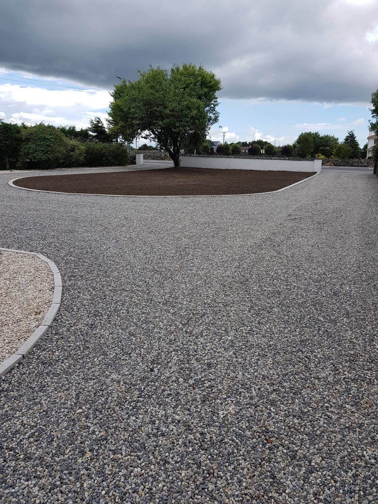 2 tone gravel driveway with a freshly planted lawn and neat kerbing in Co. Galway