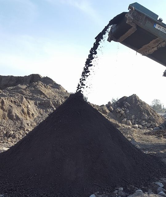 Screening machine screening topsoil in Galway.