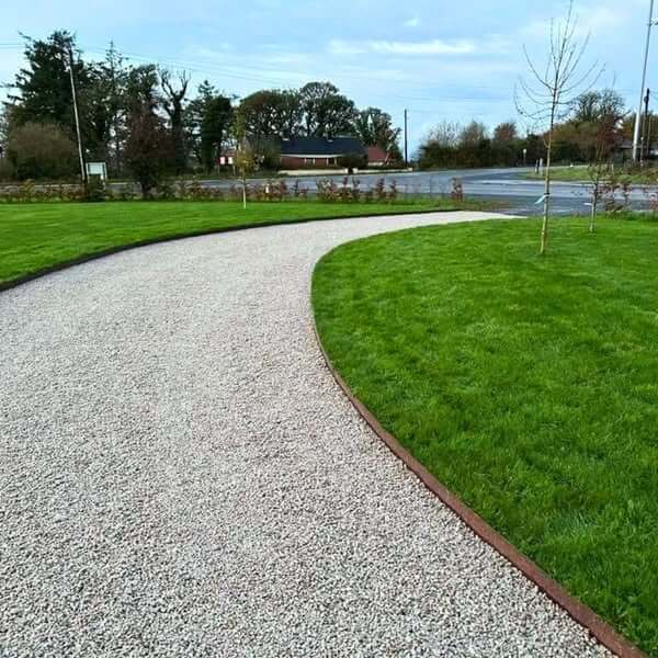 Modern driveway finished with decorative stone for a sleek, contemporary look.